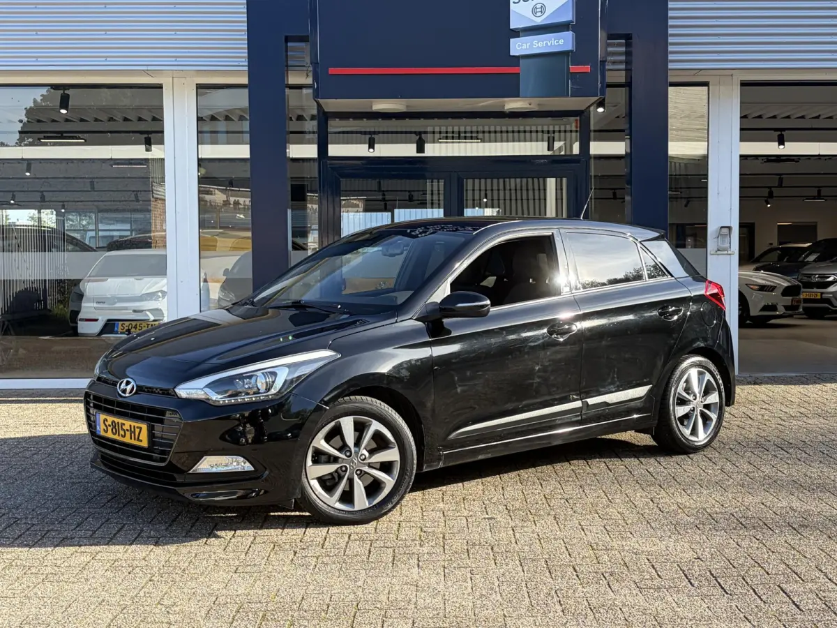 1.0 T-GDI Essence / Cruise-Control / Airco / DAB Radio-Bluetooth / Navi / PDC met Camera / 16'' LMV / ENZ.