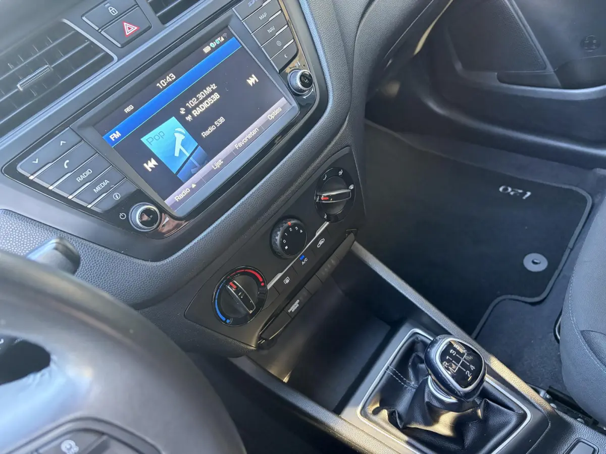 1.0 T-GDI Essence / Cruise-Control / Airco / DAB Radio-Bluetooth / Navi / PDC met Camera / 16'' LMV / ENZ.