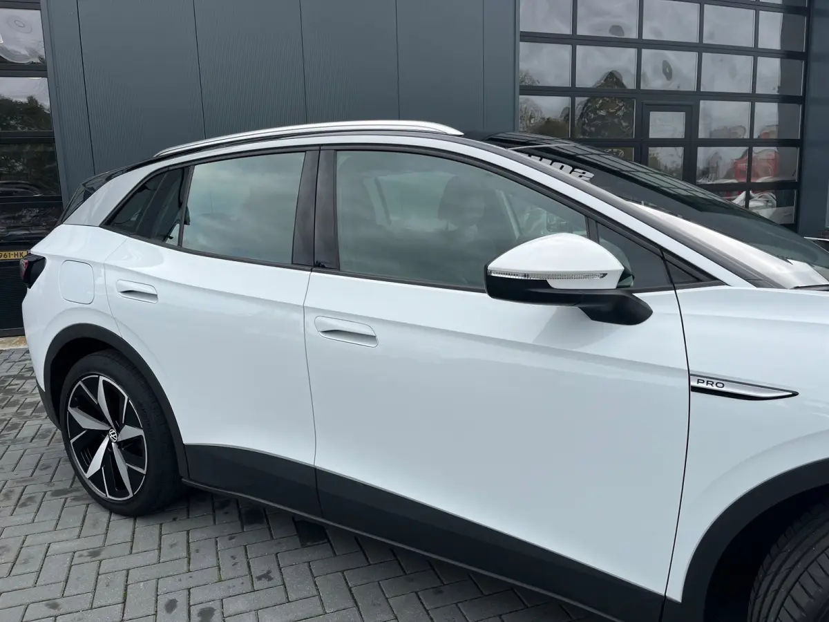 PRO 77 kWh SOH93%/Two-tone/Stoelverwarming/Carplay/1Ste Eigenaar/Dealer Onderhouden