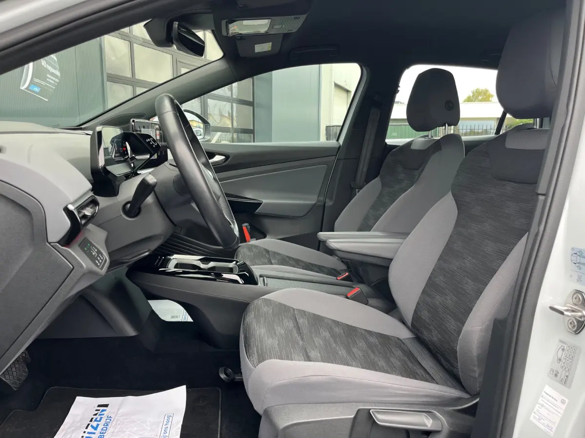 PRO 77 kWh SOH93%/Two-tone/Stoelverwarming/Carplay/1Ste Eigenaar/Dealer Onderhouden