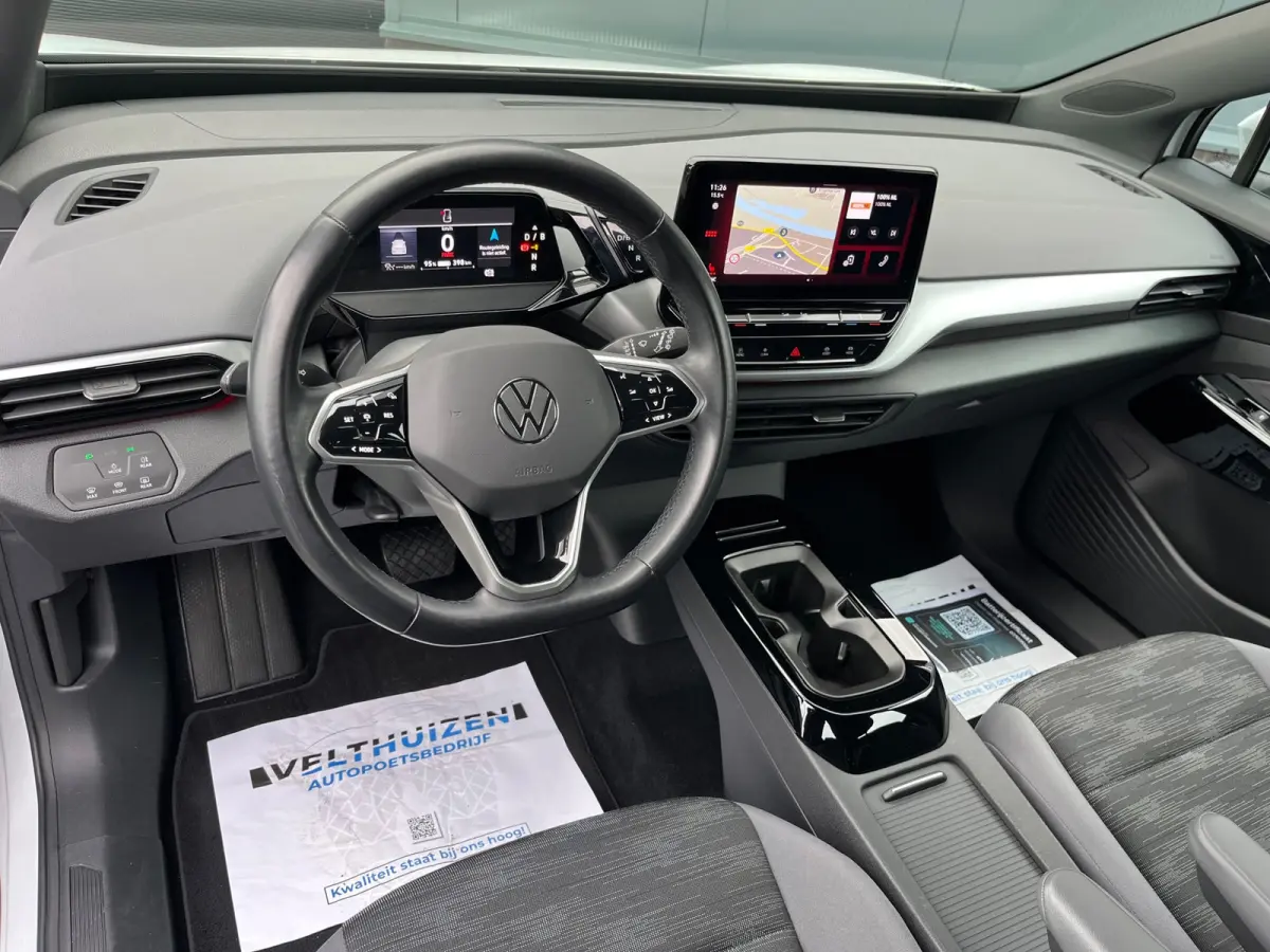 PRO 77 kWh SOH93%/Two-tone/Stoelverwarming/Carplay/1Ste Eigenaar/Dealer Onderhouden