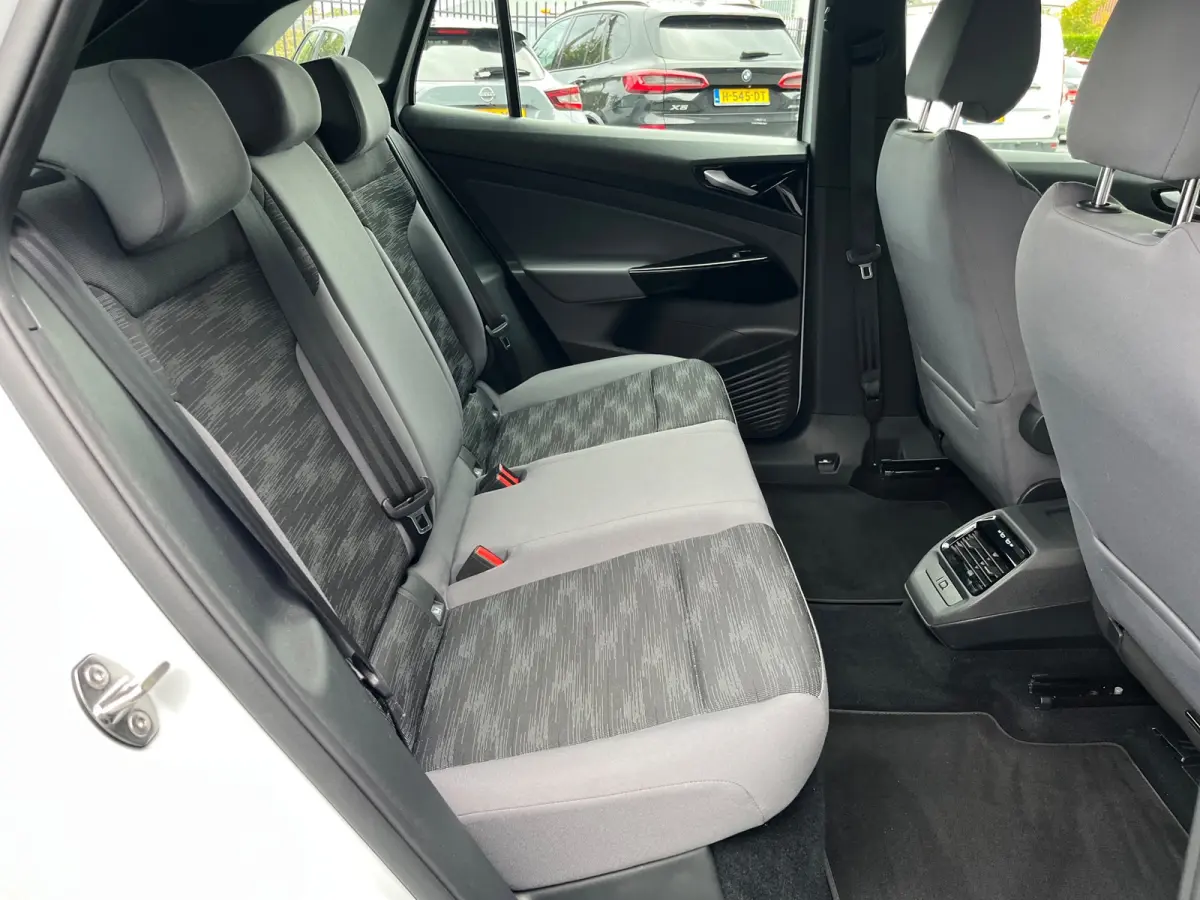 PRO 77 kWh SOH93%/Two-tone/Stoelverwarming/Carplay/1Ste Eigenaar/Dealer Onderhouden