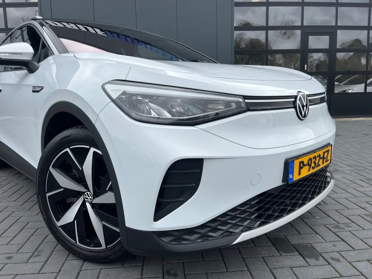 PRO 77 kWh SOH93%/Two-tone/Stoelverwarming/Carplay/1Ste Eigenaar/Dealer Onderhouden