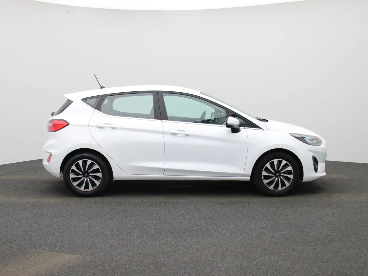 1.0 EcoBoost Hybrid Titanium | Cruise Control | Airco | Sensoren Achter | Apple Carplay/Android Auto |
