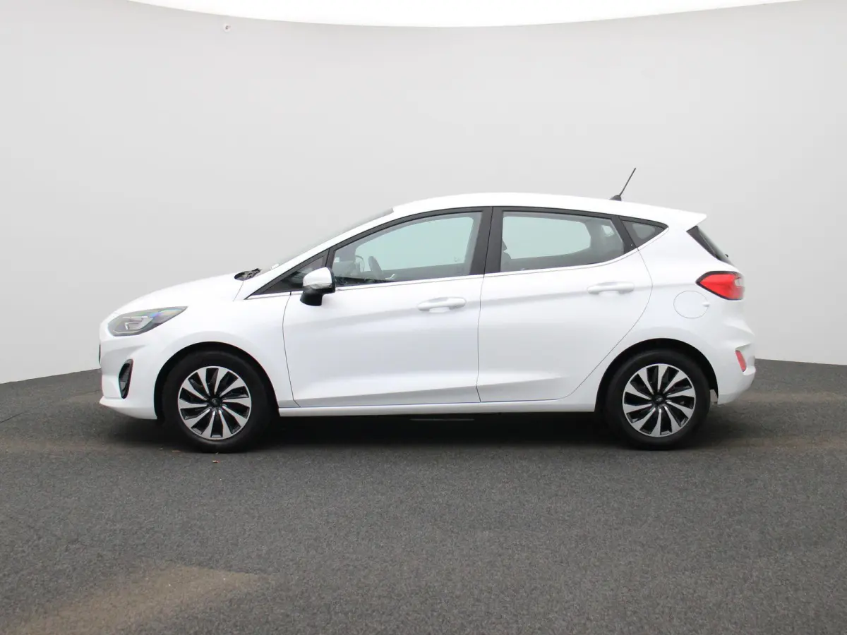 1.0 EcoBoost Hybrid Titanium | Cruise Control | Airco | Sensoren Achter | Apple Carplay/Android Auto |