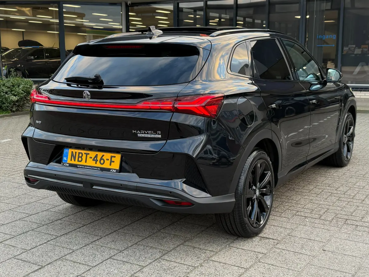 AWD Performance 70 kWh l Trekhaak l BOSE l Sfeerverlichting