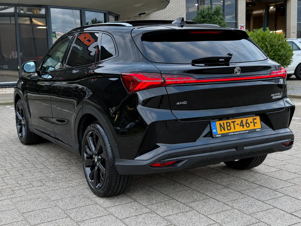 AWD Performance 70 kWh l Trekhaak l BOSE l Sfeerverlichting