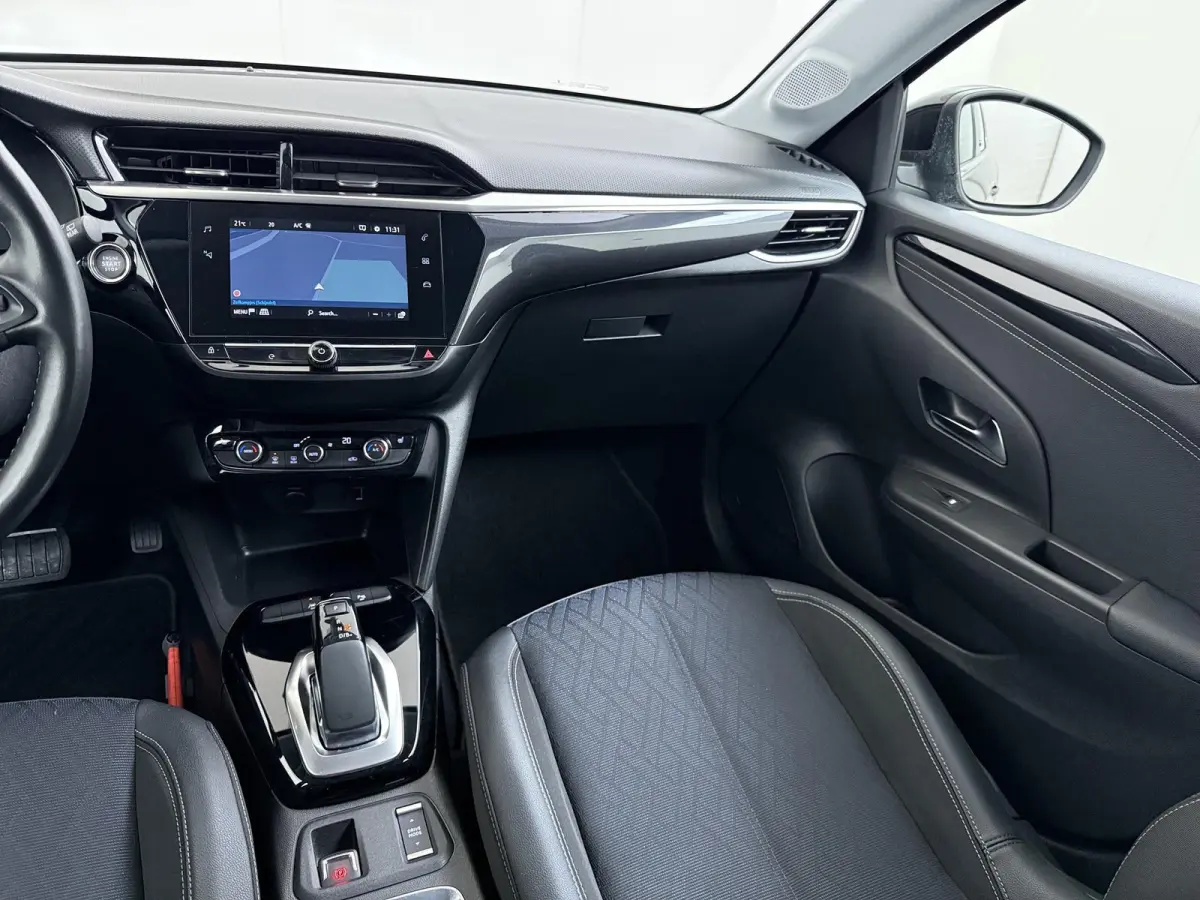 Elegance 50kWh | 1ste eigenaar | 17"LMV | Winterpakket | Navigatie | LEER/Stof | AUTOMAAT