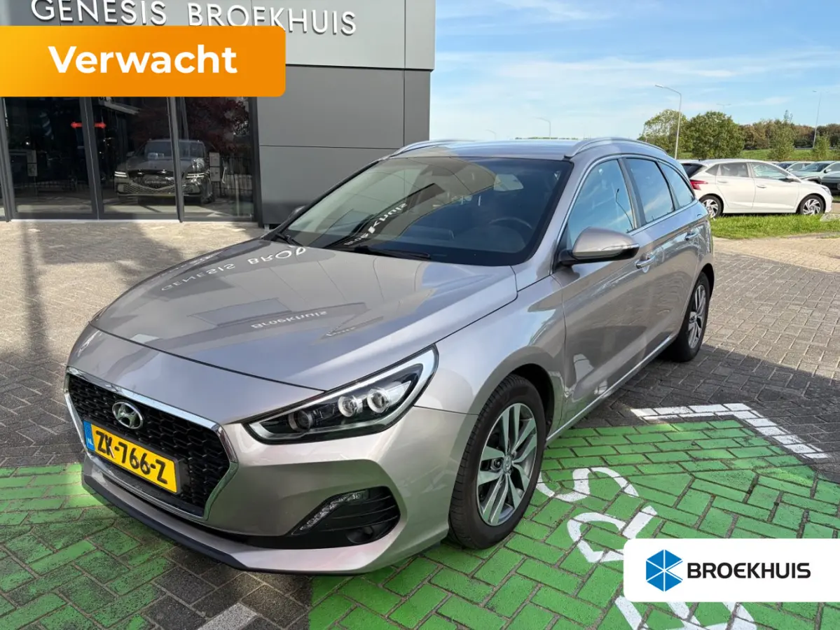 1.4 T-GDI 140pk Premium | Camera | Trekhaak | Climate controle | Carplay | Cruise controle | Half leder | Navigatie | Parkeersensoren