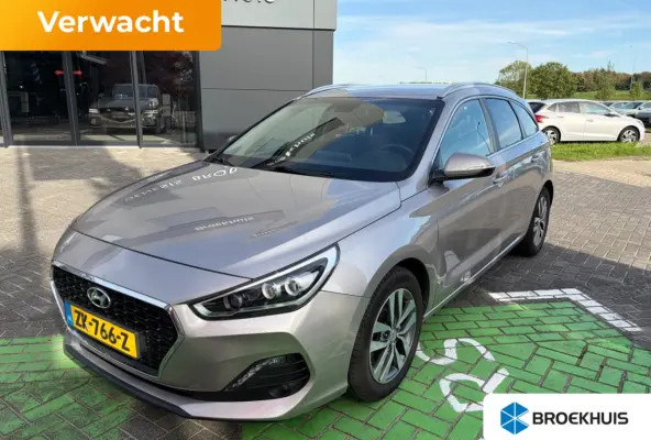 1.4 T-GDI 140pk Premium | Camera | Trekhaak | Climate controle | Carplay | Cruise controle | Half leder | Navigatie | Parkeersensoren