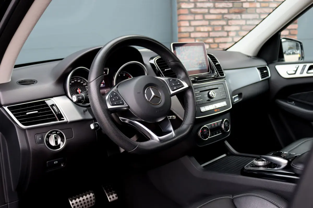 400 4MATIC AMG Line | Distronic+ | Luchtvering | Schuifdak | Trekhaak | Nappa-Leder | Surround Camera | Sfeerverlichting | Stoelverwarming | Dodehoekassistent |