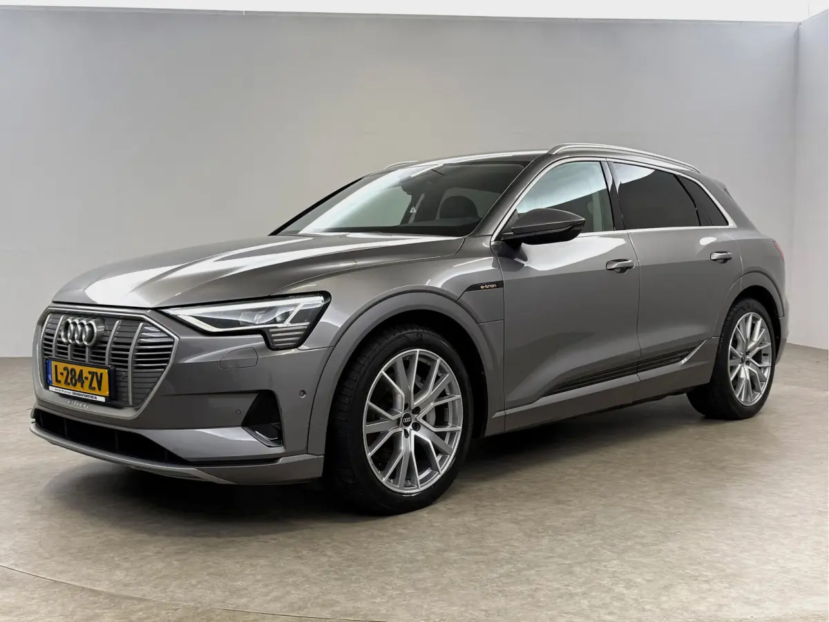 55 quattro Advanced edition 95 kWh | Snelladen | SOH 90% | Luchtvering | Virtual | Memory | Clima | Trekhaak | Keyless | LED