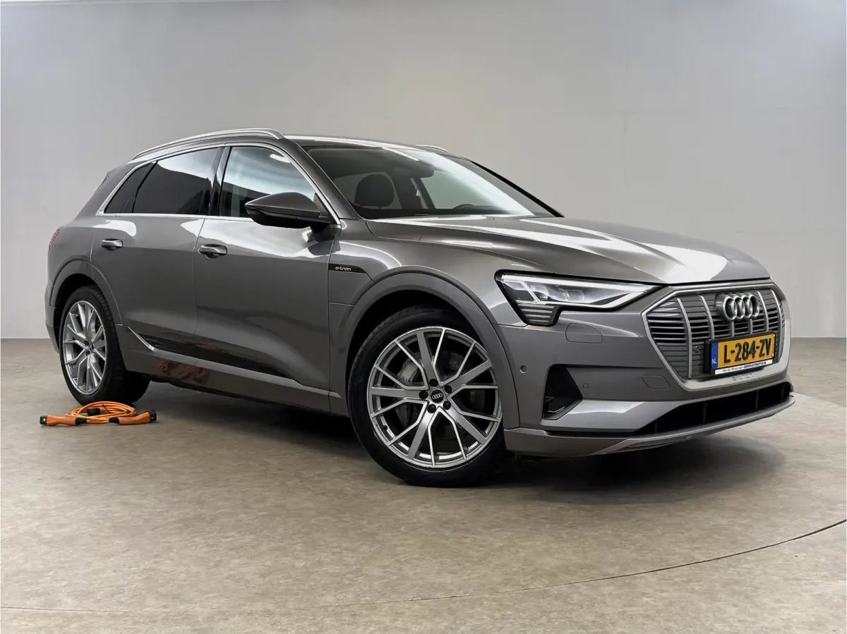 55 quattro Advanced edition 95 kWh | Snelladen | SOH 90% | Luchtvering | Virtual | Memory | Clima | Trekhaak | Keyless | LED