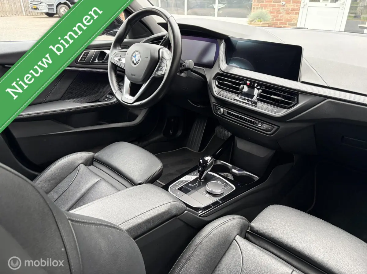 118i M Sport Business|Leer|Parkeersensor V/A|Camera|Stoelverwarming.
