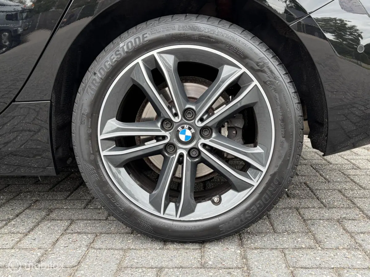118i M Sport Business|Leer|Parkeersensor V/A|Camera|Stoelverwarming.