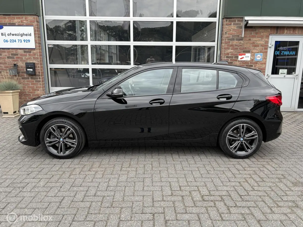 118i M Sport Business|Leer|Parkeersensor V/A|Camera|Stoelverwarming.