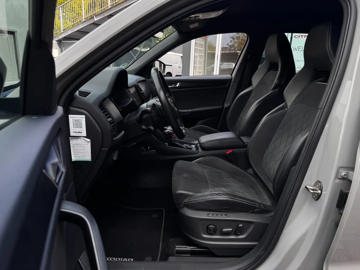 1.5 TSI Sportline Business | NL-Auto | Sportstoelen + Memory | Camera | Winter Pack | Adaptive Cruise