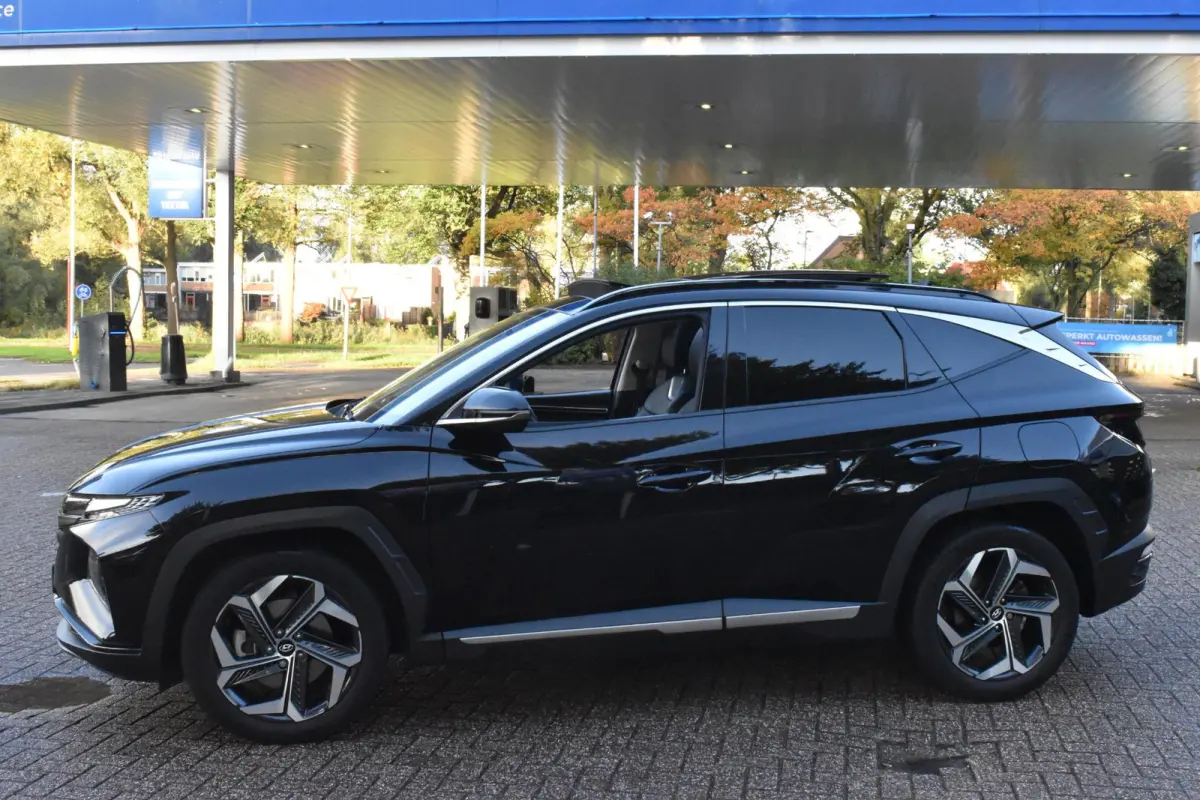 1.6 T-GDI HEV Premium Sky 100% Dealer onderhouden | Schuifdak | Leder | Memory | 12 mnd BOVAG garantie | Whatsapp 06-53188999