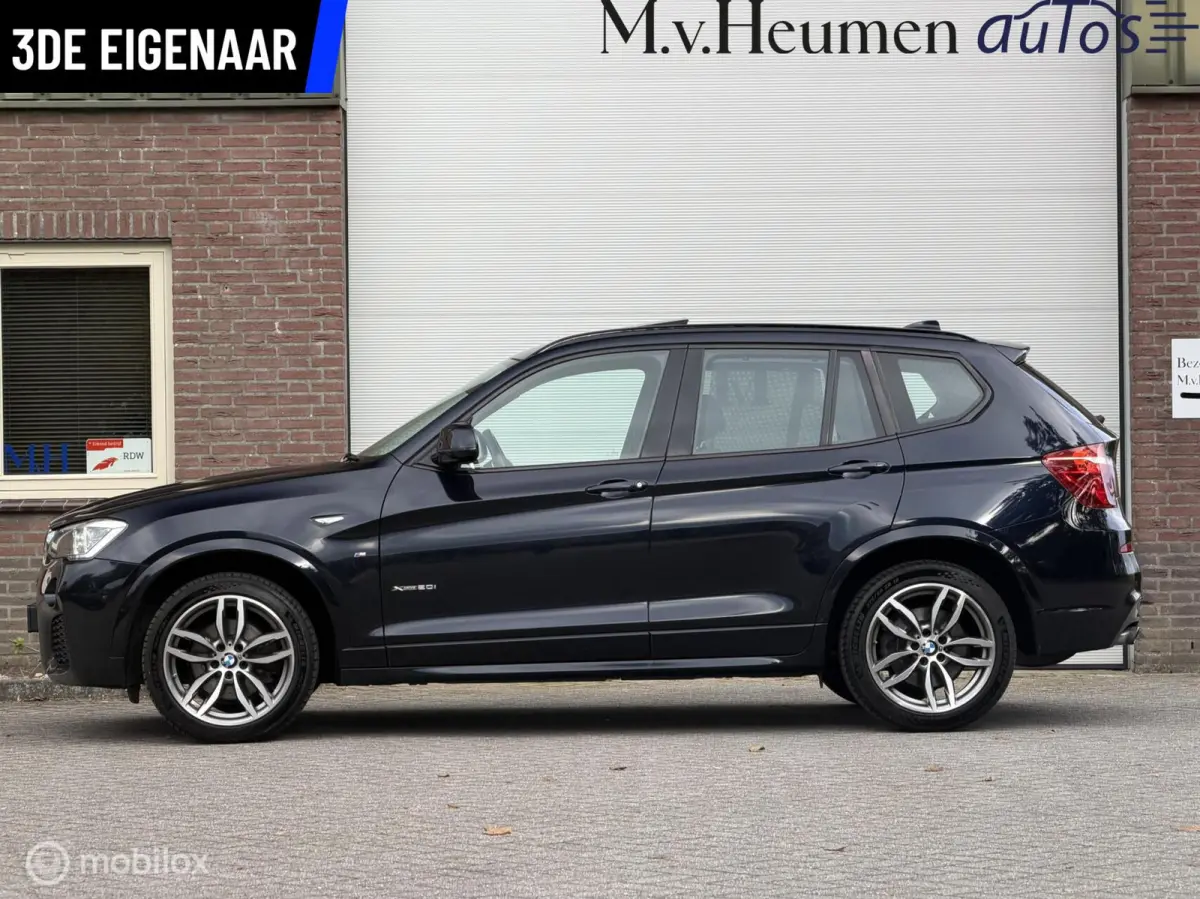 xDrive20i LCi High Executive M-Sport ORG NED Panoramdak