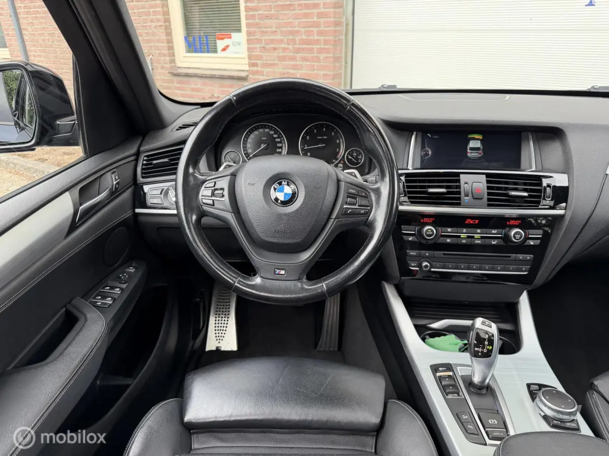 xDrive20i LCi High Executive M-Sport ORG NED Panoramdak