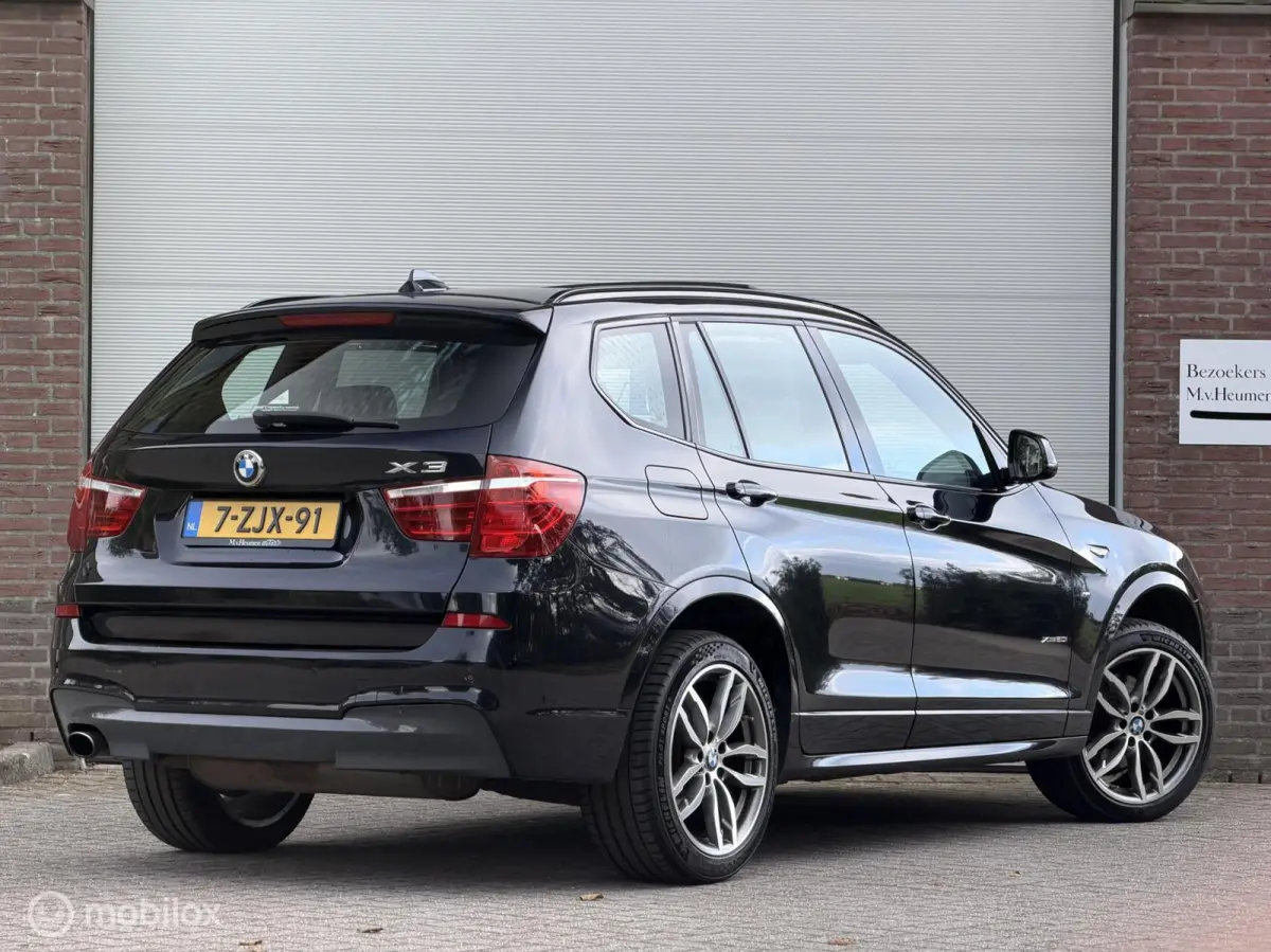 xDrive20i LCi High Executive M-Sport ORG NED Panoramdak