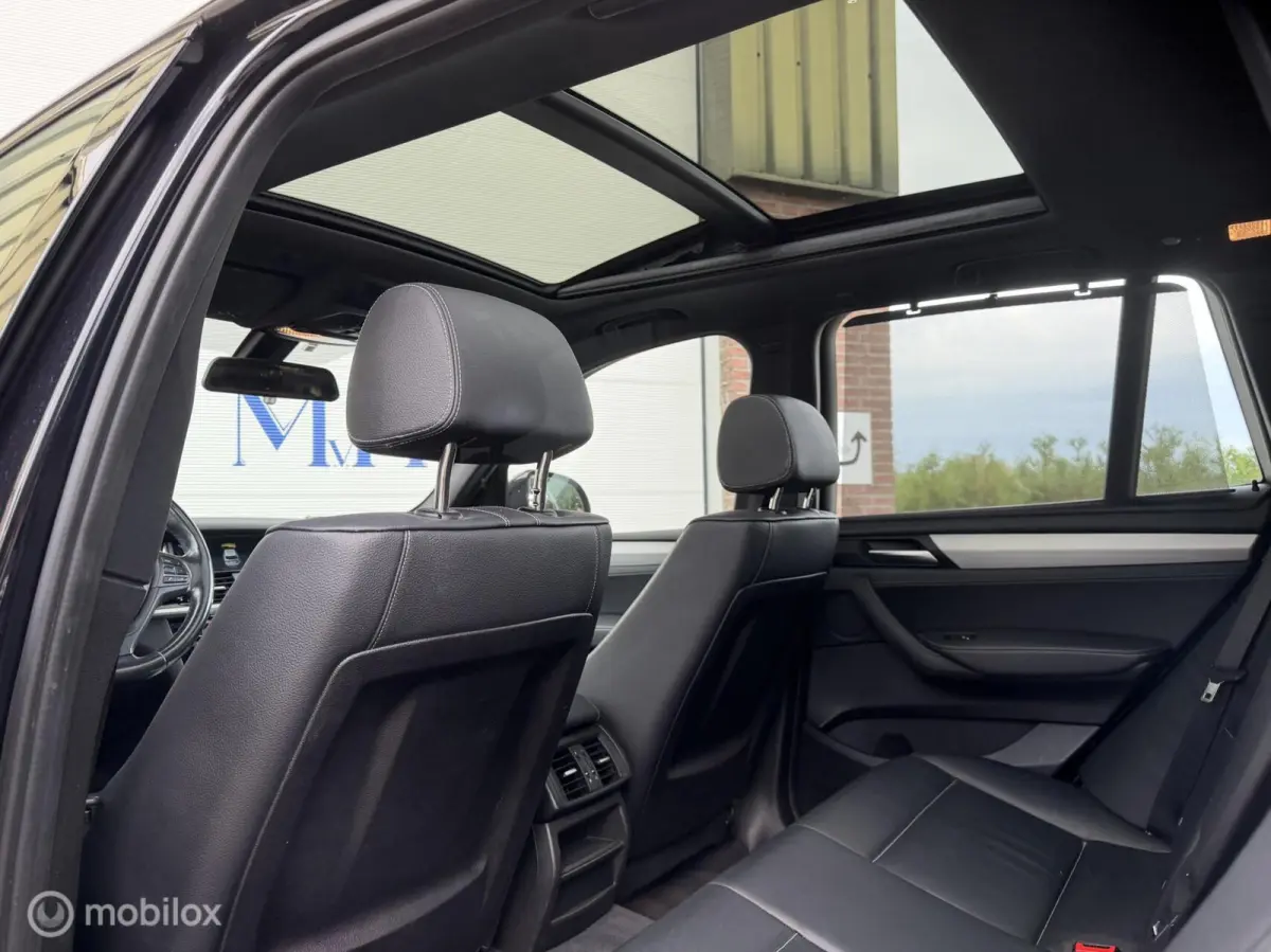 xDrive20i LCi High Executive M-Sport ORG NED Panoramdak