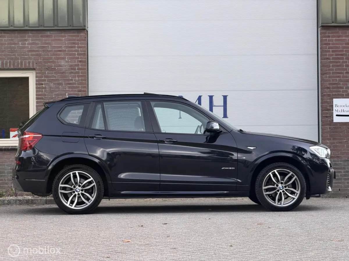 xDrive20i LCi High Executive M-Sport ORG NED Panoramdak