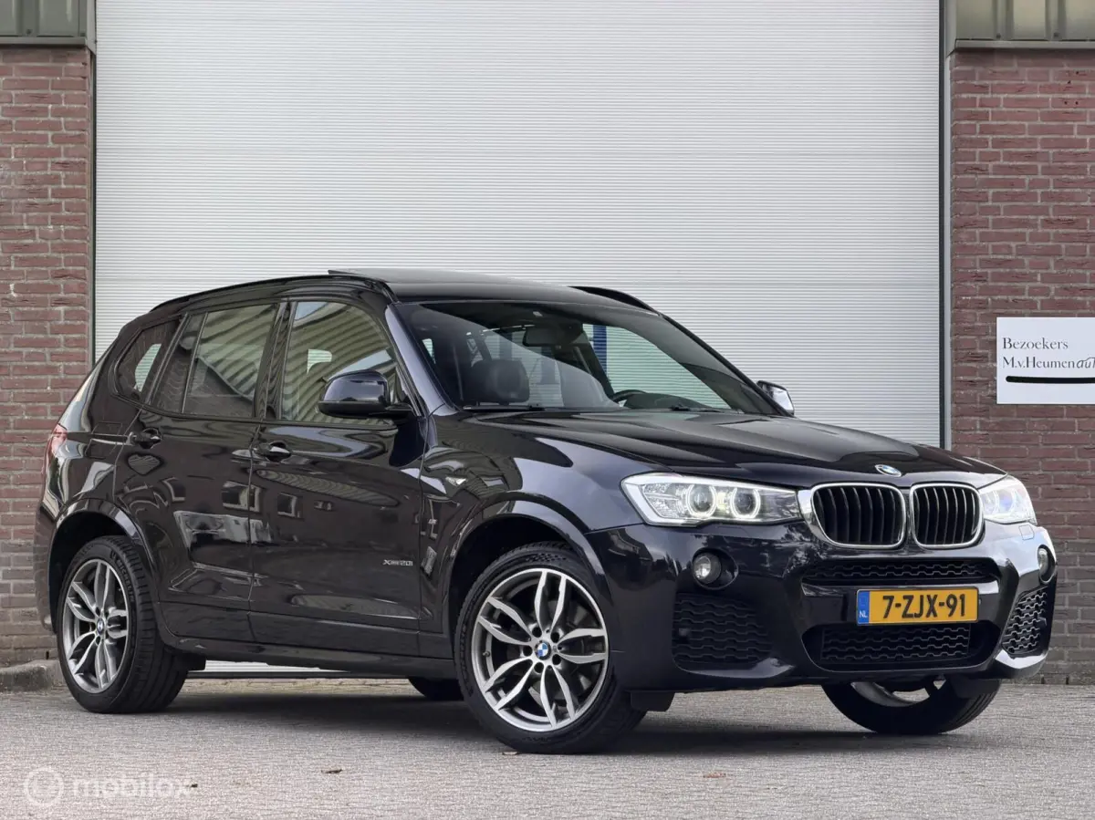 xDrive20i LCi High Executive M-Sport ORG NED Panoramdak