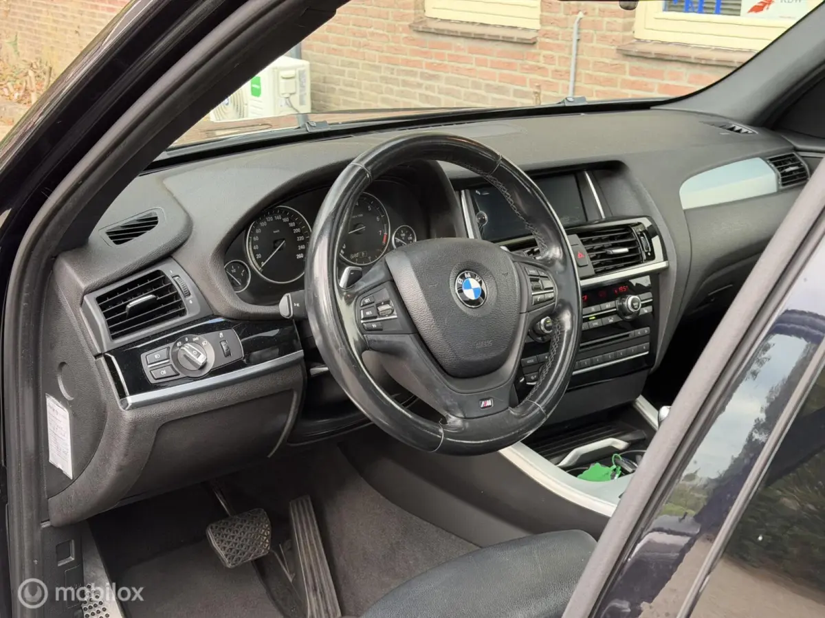 xDrive20i LCi High Executive M-Sport ORG NED Panoramdak