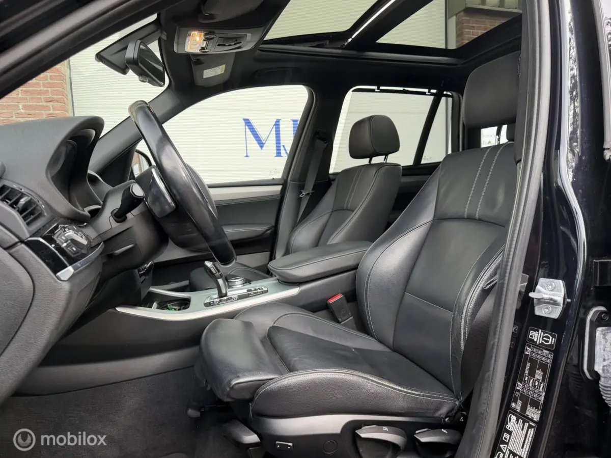 xDrive20i LCi High Executive M-Sport ORG NED Panoramdak