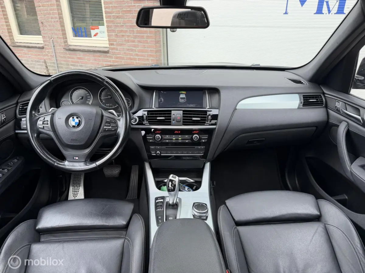 xDrive20i LCi High Executive M-Sport ORG NED Panoramdak