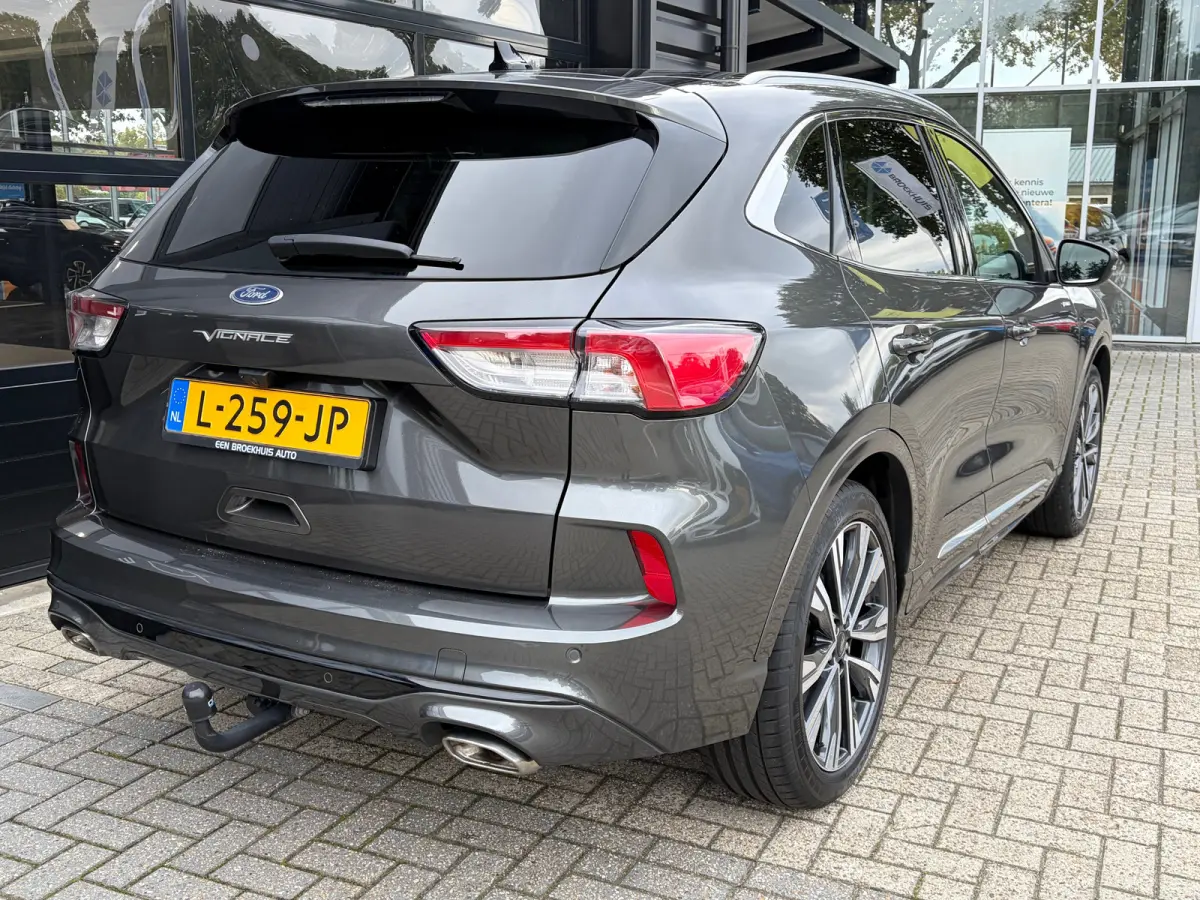2.5 PHEV 225 PK Vignale | 87% SOH| TREKHAAK| ELEK. SCHUIF-/KANTELDAK| LEDER MET GEHEUGEN| ELEK. ACHTERKLEP| STUUR, STOEL, VOORRUIT EN ACHTERBANK VERWARMING| KEYLESS ENTRY & START| FULL LED| 