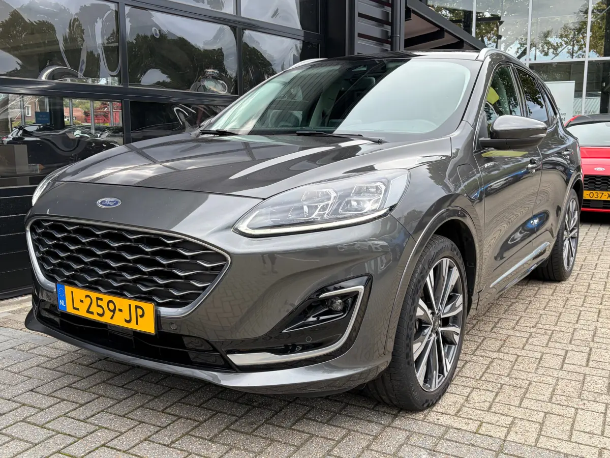 2.5 PHEV 225 PK Vignale | 87% SOH| TREKHAAK| ELEK. SCHUIF-/KANTELDAK| LEDER MET GEHEUGEN| ELEK. ACHTERKLEP| STUUR, STOEL, VOORRUIT EN ACHTERBANK VERWARMING| KEYLESS ENTRY & START| FULL LED| 
