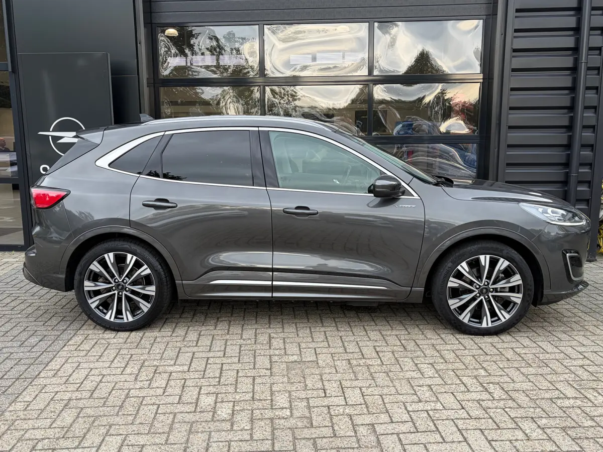 2.5 PHEV 225 PK Vignale | 87% SOH| TREKHAAK| ELEK. SCHUIF-/KANTELDAK| LEDER MET GEHEUGEN| ELEK. ACHTERKLEP| STUUR, STOEL, VOORRUIT EN ACHTERBANK VERWARMING| KEYLESS ENTRY & START| FULL LED| 