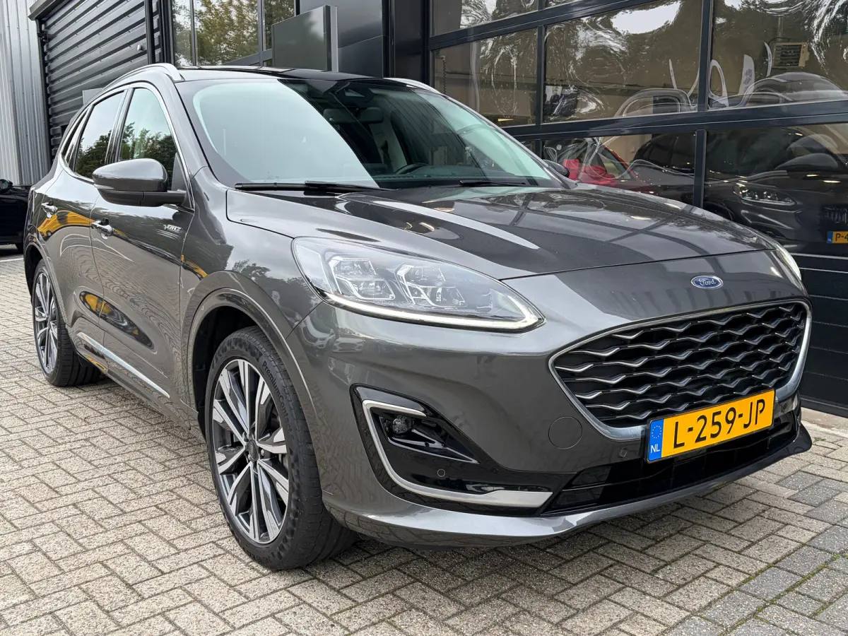 2.5 PHEV 225 PK Vignale | 87% SOH| TREKHAAK| ELEK. SCHUIF-/KANTELDAK| LEDER MET GEHEUGEN| ELEK. ACHTERKLEP| STUUR, STOEL, VOORRUIT EN ACHTERBANK VERWARMING| KEYLESS ENTRY & START| FULL LED| 