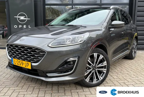 2.5 PHEV 225 PK Vignale | 87% SOH| TREKHAAK| ELEK. SCHUIF-/KANTELDAK| LEDER MET GEHEUGEN| ELEK. ACHTERKLEP| STUUR, STOEL, VOORRUIT EN ACHTERBANK VERWARMING| KEYLESS ENTRY & START| FULL LED| 