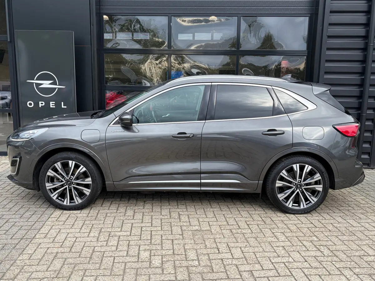 2.5 PHEV 225 PK Vignale | 87% SOH| TREKHAAK| ELEK. SCHUIF-/KANTELDAK| LEDER MET GEHEUGEN| ELEK. ACHTERKLEP| STUUR, STOEL, VOORRUIT EN ACHTERBANK VERWARMING| KEYLESS ENTRY & START| FULL LED| 