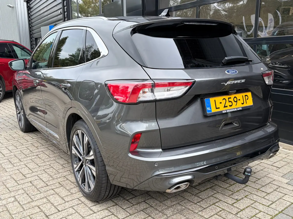 2.5 PHEV 225 PK Vignale | 87% SOH| TREKHAAK| ELEK. SCHUIF-/KANTELDAK| LEDER MET GEHEUGEN| ELEK. ACHTERKLEP| STUUR, STOEL, VOORRUIT EN ACHTERBANK VERWARMING| KEYLESS ENTRY & START| FULL LED| 