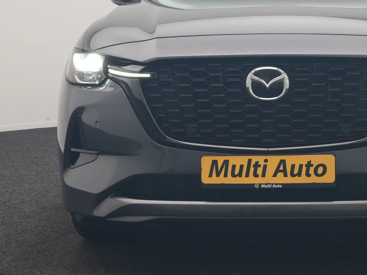 2.5 e-SkyActiv PHEV Homura 327pk Dealer O.H. | SOH 89,9% | Trekhaak Af Fabriek | Adaptive Cruise | Head Up | Camera | Lederen Sportstoelen & Stuur Verwarmd | BLIS | Keyless | Apple Carplay |