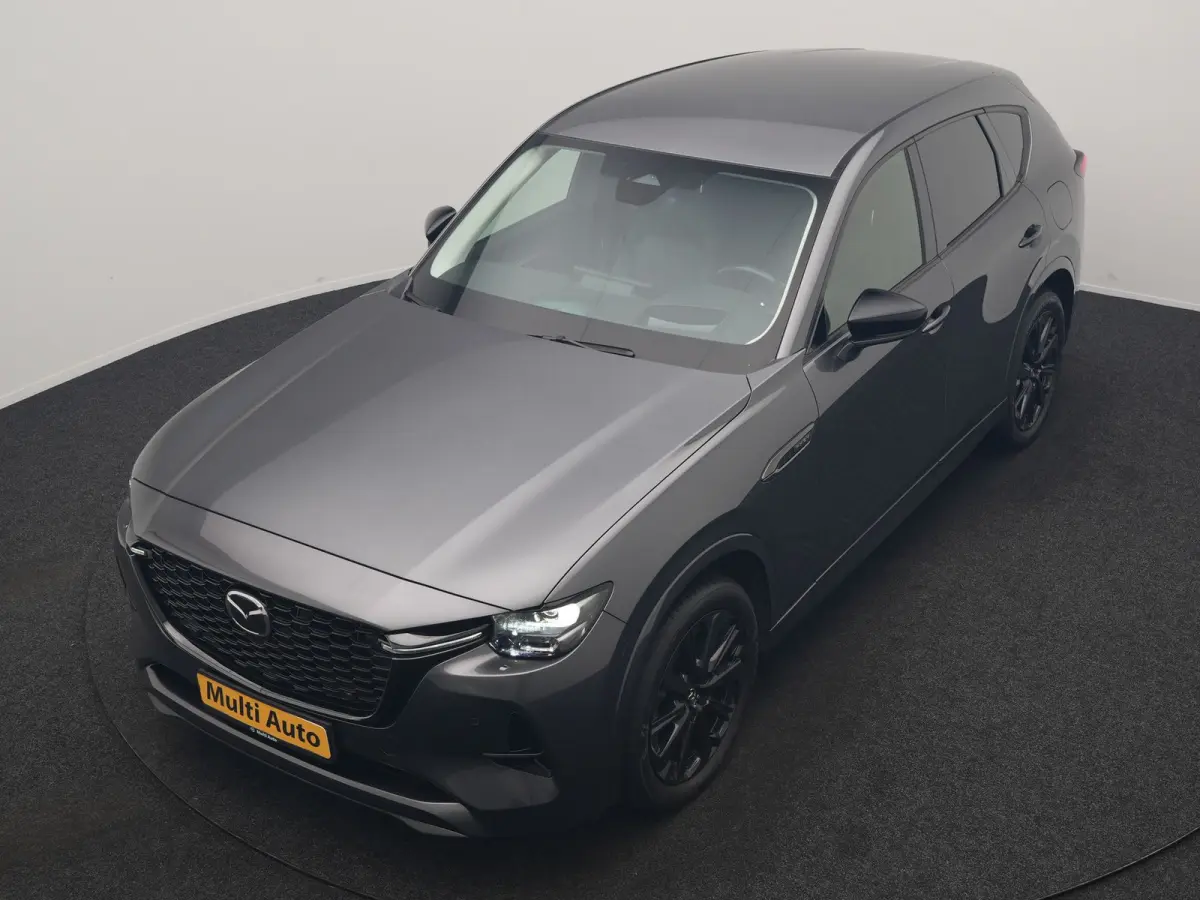 2.5 e-SkyActiv PHEV Homura 327pk Dealer O.H. | SOH 89,9% | Trekhaak Af Fabriek | Adaptive Cruise | Head Up | Camera | Lederen Sportstoelen & Stuur Verwarmd | BLIS | Keyless | Apple Carplay |