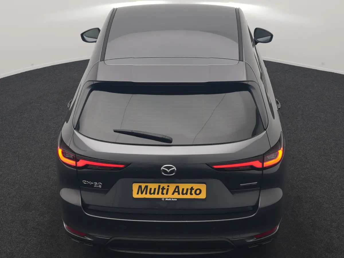 2.5 e-SkyActiv PHEV Homura 327pk Dealer O.H. | SOH 89,9% | Trekhaak Af Fabriek | Adaptive Cruise | Head Up | Camera | Lederen Sportstoelen & Stuur Verwarmd | BLIS | Keyless | Apple Carplay |