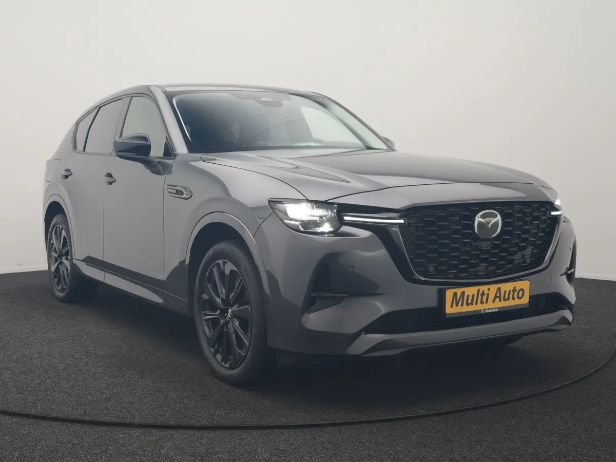 2.5 e-SkyActiv PHEV Homura 327pk Dealer O.H. | SOH 89,9% | Trekhaak Af Fabriek | Adaptive Cruise | Head Up | Camera | Lederen Sportstoelen & Stuur Verwarmd | BLIS | Keyless | Apple Carplay |