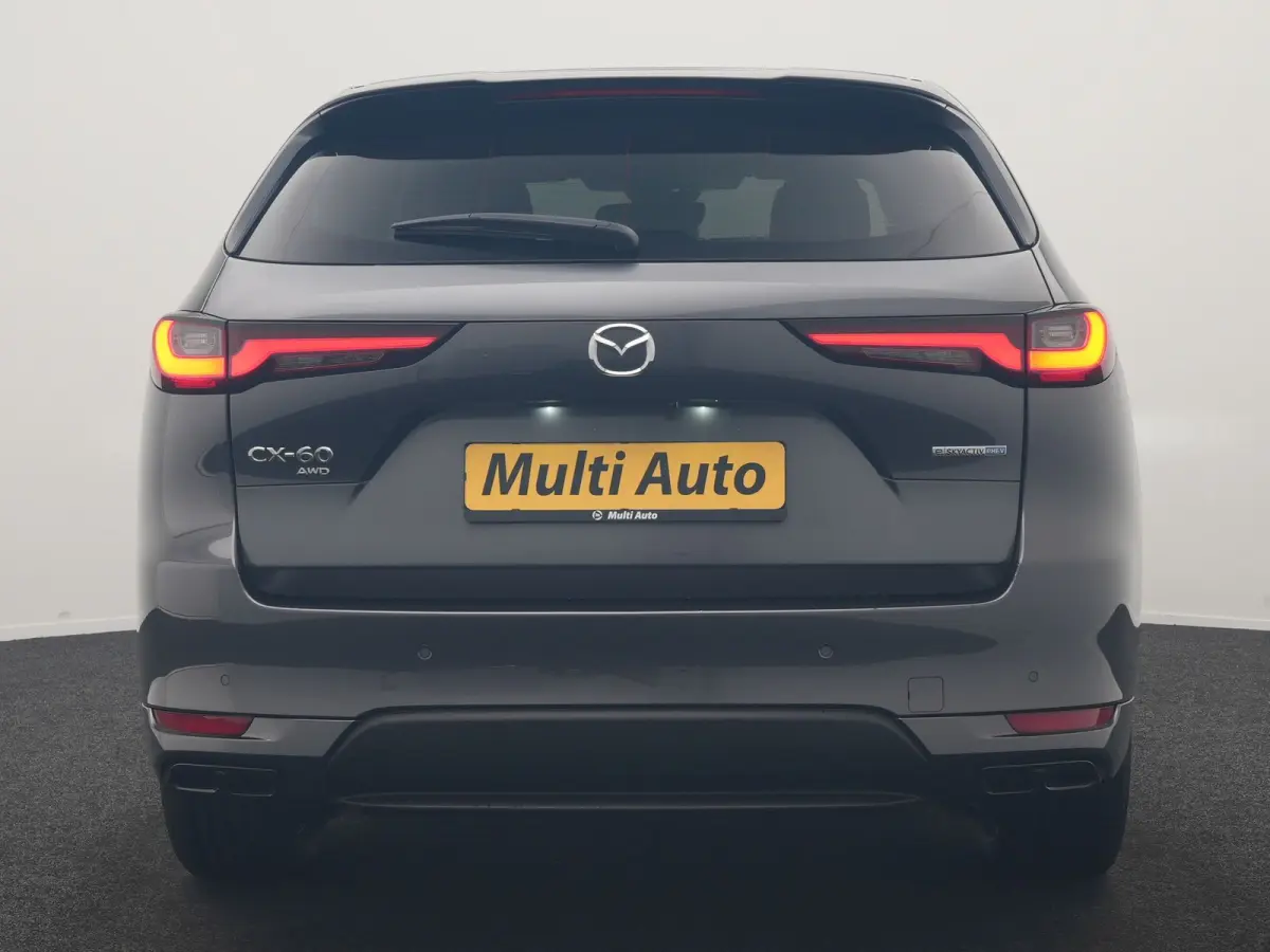 2.5 e-SkyActiv PHEV Homura 327pk Dealer O.H. | SOH 89,9% | Trekhaak Af Fabriek | Adaptive Cruise | Head Up | Camera | Lederen Sportstoelen & Stuur Verwarmd | BLIS | Keyless | Apple Carplay |
