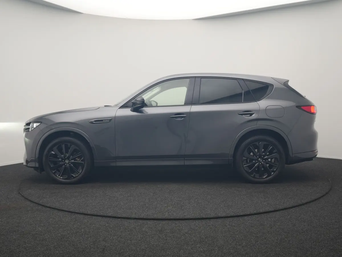 2.5 e-SkyActiv PHEV Homura 327pk Dealer O.H. | SOH 89,9% | Trekhaak Af Fabriek | Adaptive Cruise | Head Up | Camera | Lederen Sportstoelen & Stuur Verwarmd | BLIS | Keyless | Apple Carplay |