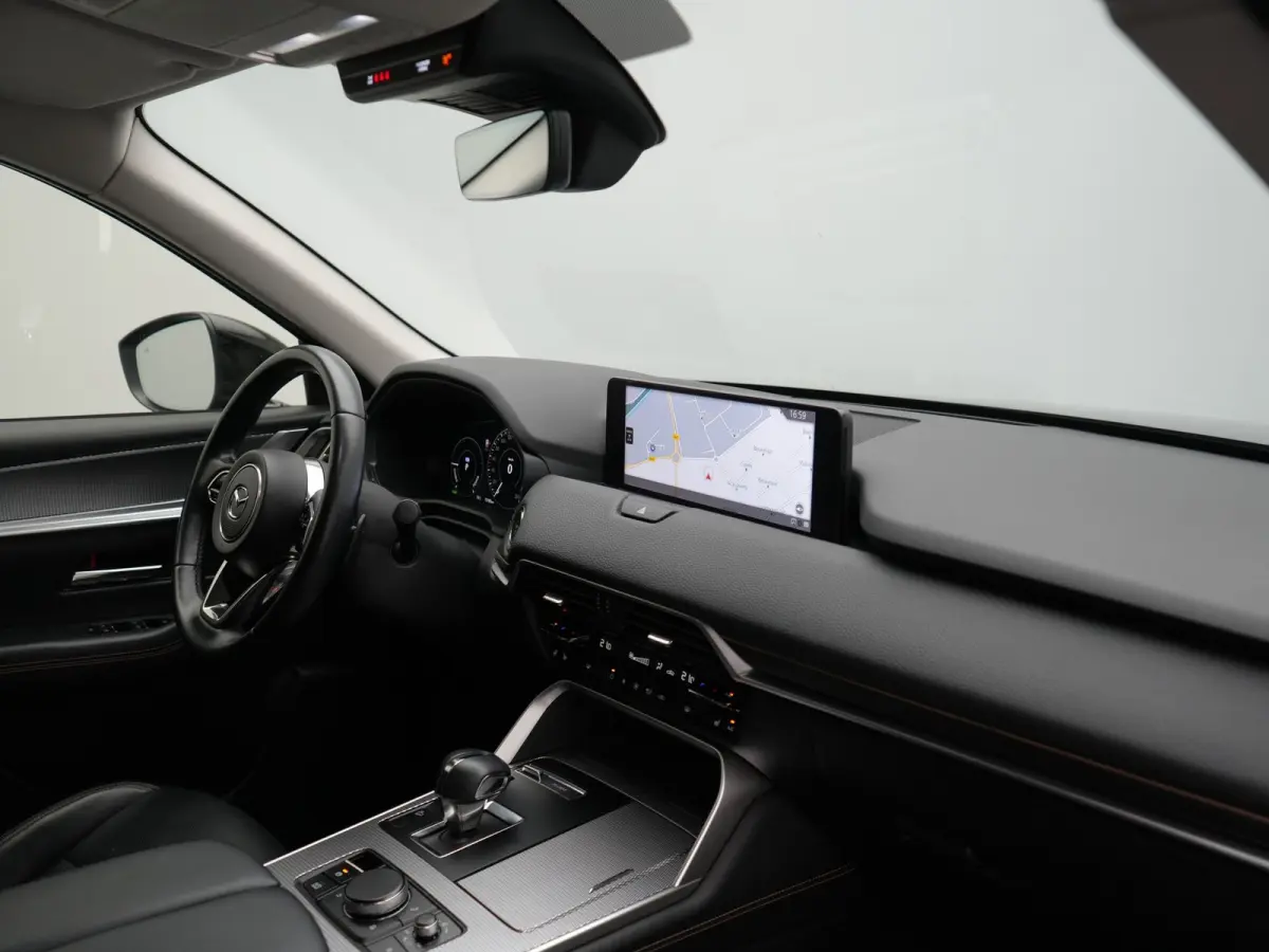 2.5 e-SkyActiv PHEV Homura 327pk Dealer O.H. | SOH 89,9% | Trekhaak Af Fabriek | Adaptive Cruise | Head Up | Camera | Lederen Sportstoelen & Stuur Verwarmd | BLIS | Keyless | Apple Carplay |