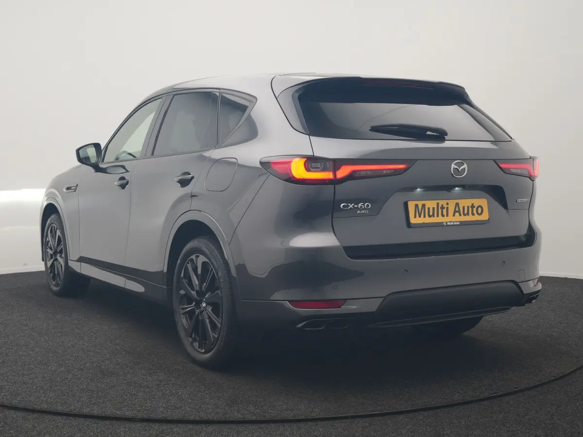 2.5 e-SkyActiv PHEV Homura 327pk Dealer O.H. | SOH 89,9% | Trekhaak Af Fabriek | Adaptive Cruise | Head Up | Camera | Lederen Sportstoelen & Stuur Verwarmd | BLIS | Keyless | Apple Carplay |