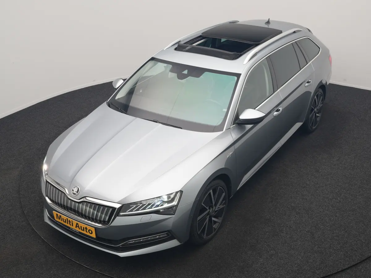 1.4 TSI iV Laurin & Klement PHEV 218pk Dealer O.H. | Trekhaak Af Fabriek | Panodak | Adaptive Cruise | 360 Camera | Canton Audio | Lederen Comfortstoelen Memory & Massage & Ventilatie | Sfee