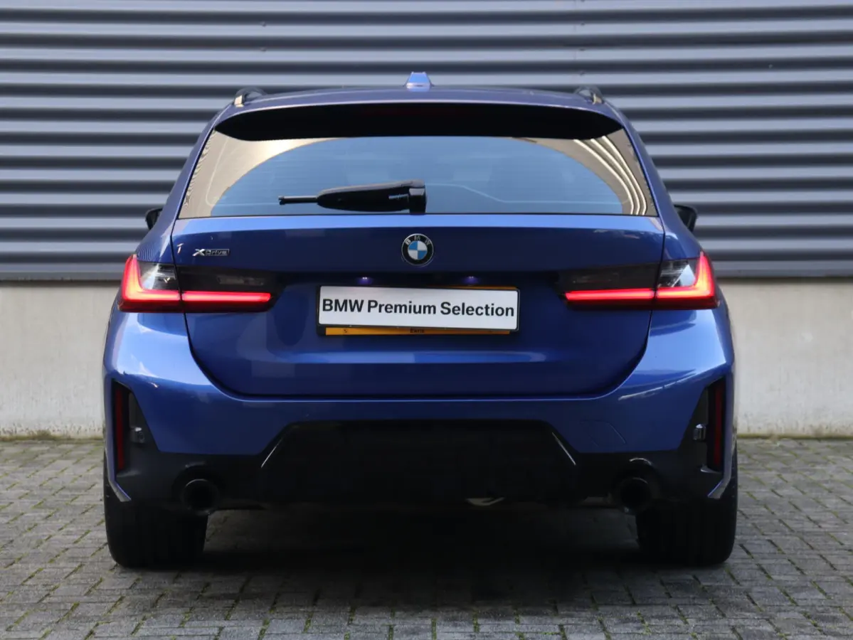 330i xDrive | M Sportpakket Pro | Panodak | Trekhaak | Head-Up | Parking Assistant Plus | Getint Glas | Comfort Access | 18'' LMV