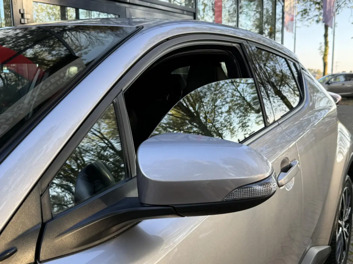 1.8 Hybrid Executive | Navigatie | Climate Control | Stoelverwarming | Cruise Control | Licht metalen velgen