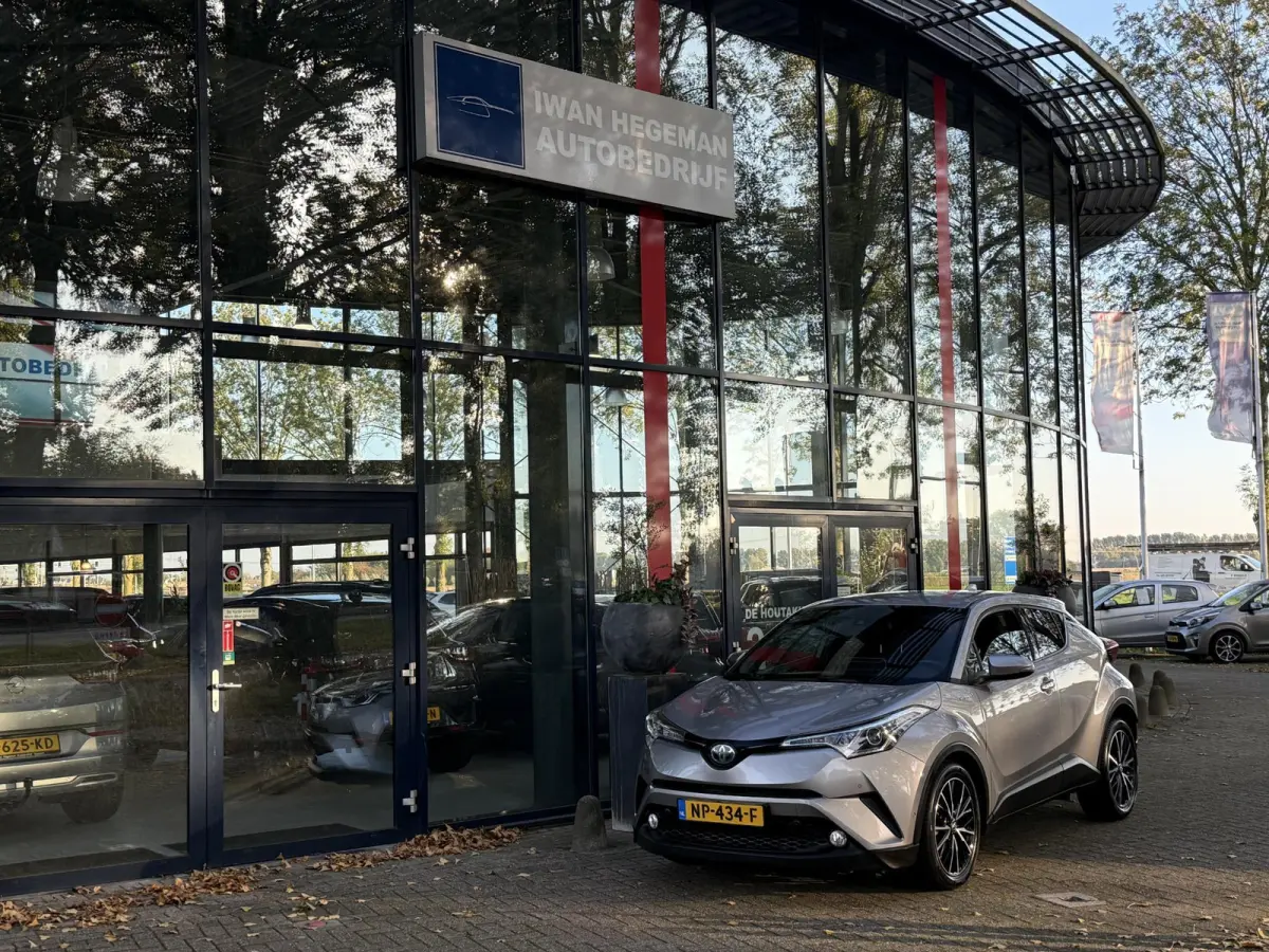 1.8 Hybrid Executive | Navigatie | Climate Control | Stoelverwarming | Cruise Control | Licht metalen velgen
